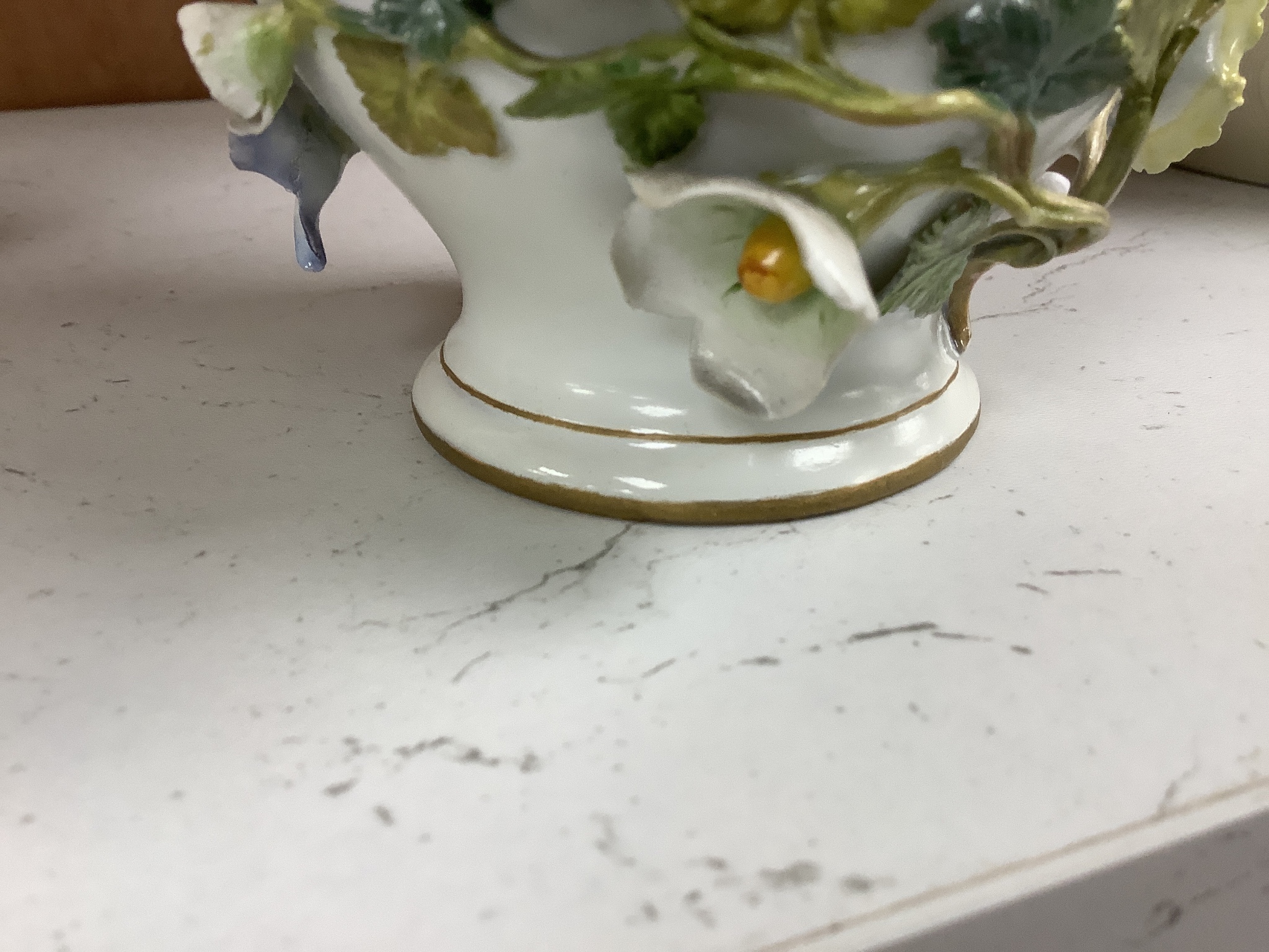 Two similar 19th century Meissen pot pourri vases and one cover, tallest 20cm